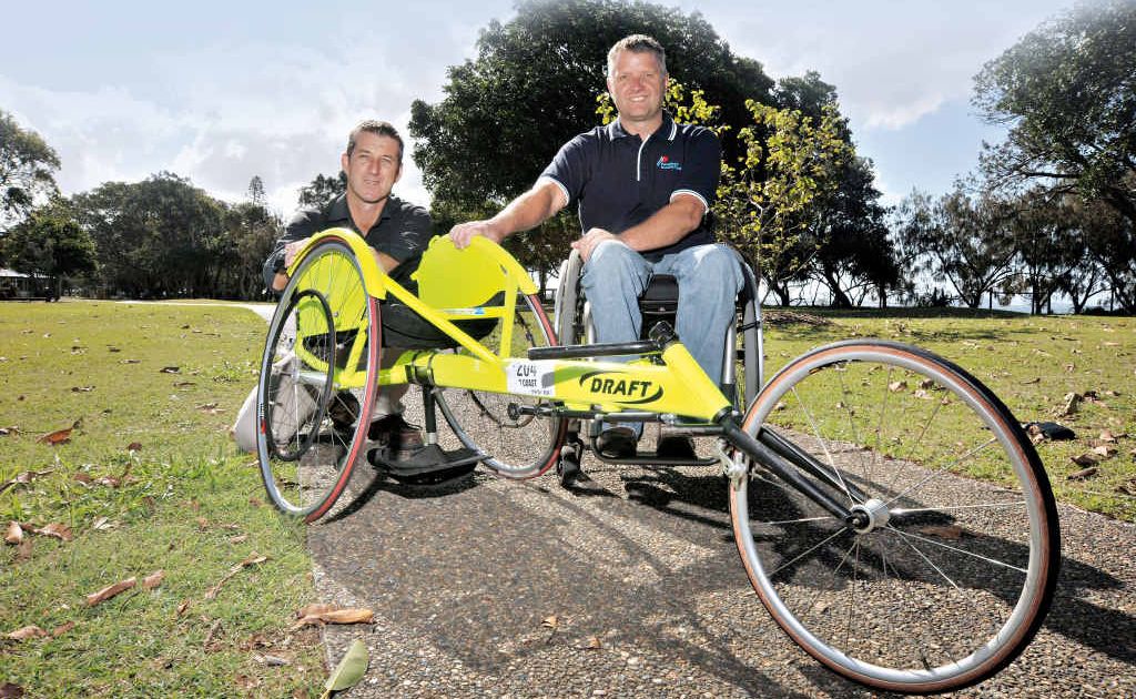 President of the Sunshine Coast Triathlon Club, Matt Dillon with paratriathlete Darron Shields. President of the Sunshine Coast Triathlon Club, Matt Dillon with paratriathlete Darron Shields.